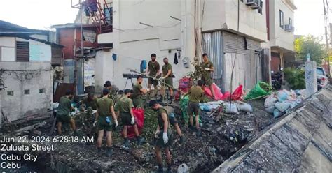 Cebu City gov’t employees haul over 80 tons of garbage.